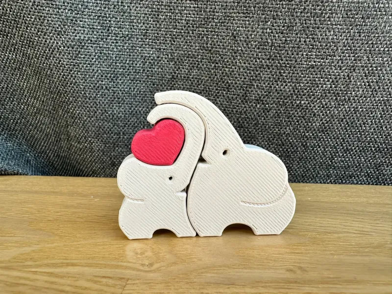 Mother elephant and baby elephant with heart
